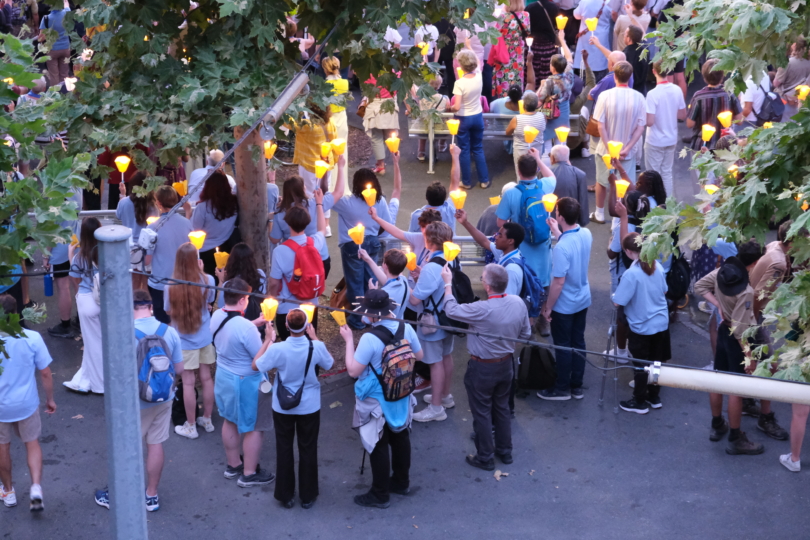 People carrying candles