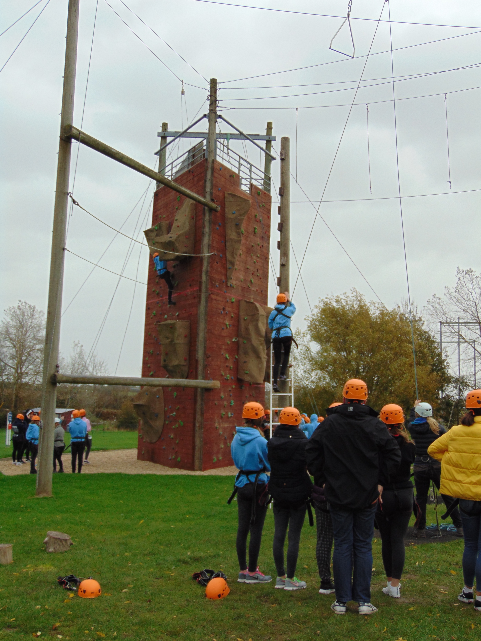 Young people at climbing wall